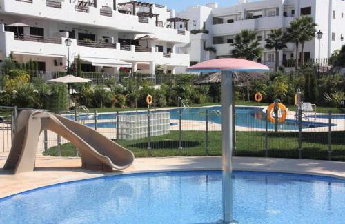 Mar de Pulpi Apartamento | Casa Tapas y vino apartamento con jardin y piscina comunitaria