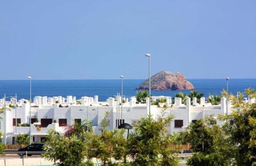 Mar de Pulpi Apartamento | Casa Tapas y vino apartamento con jardin y piscina comunitaria