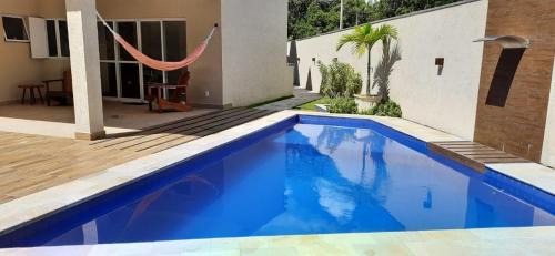 Costa do Sol Casa | CASA TERREA WI-FI 3 SUITES 900m PRAIA DE GUARATUBA SP