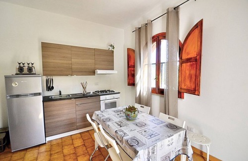 Pucara Casa | Casa Trifone B: A graceful apartment that is part of a villa surrounded by the greenery, with Free WI-FI.