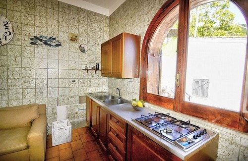 Pucara Casa | Casa Trifone D: A graceful apartment that is part of a villa surrounded by the greenery, with Free WI-FI.