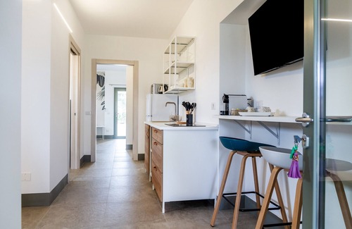 Saline Sadun Apartamento | 'Casale Lorenzo - Apartamento 1' con terraza privada, jardín compartido y aire acondicionado