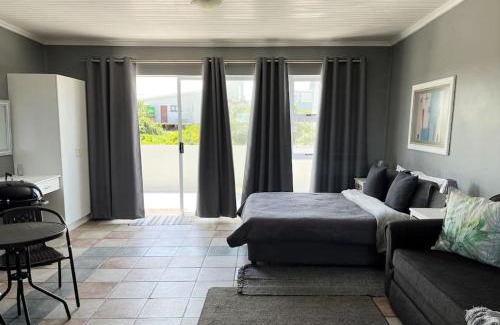 Cape Saint Francis Apartamento | Casual, beachy and 100m to Seals Surf Spot