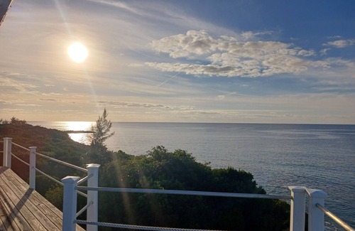 Port Howe Casa | Cat Island Paradise . Overlooking turquoise waters and sky, sunrise and sunset.
