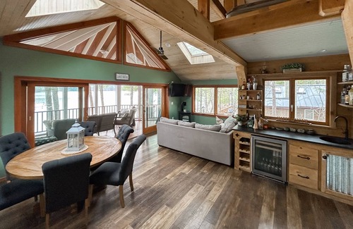 Pine River Pond Casa | Central lakefront house with private hot tub, dock, patio bar, & beach access