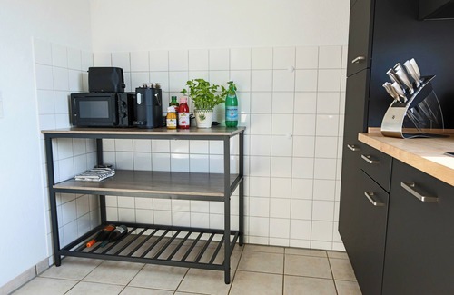 Korbecke Apartamento | Central, stylish and modern holiday apartment with balcony and box-spring beds