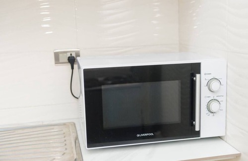 Gombe Apartamento | Centralized in Gombe & accessible - 1BR Entire rental unit in Kinshasa