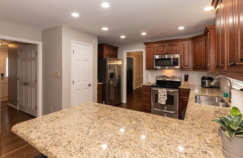 Apex Casa | Centrally located by Cary & Holly Springs with a private serene wooded backyard!