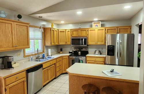 Fargo Casa | Centrally located home blocks from Bluemont lake