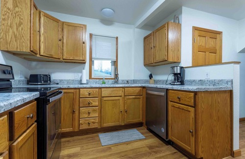 Dubuque Casa | Centrally located in family friendly neighborhood with off street parking.
