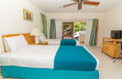 Blue Waters Hotel | Centrally Located near Rockley; Pool, Free WiFi - Fully Equipped Kitchen