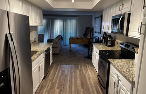 West University Casa | Centrally located to everything Reno! Family home w/ arcade games & full patio.