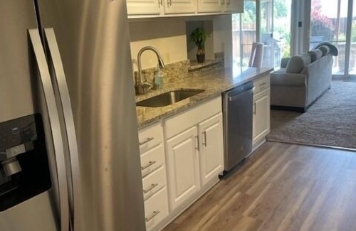 West University Casa | Centrally located to everything Reno! Family home w/ arcade games & full patio.