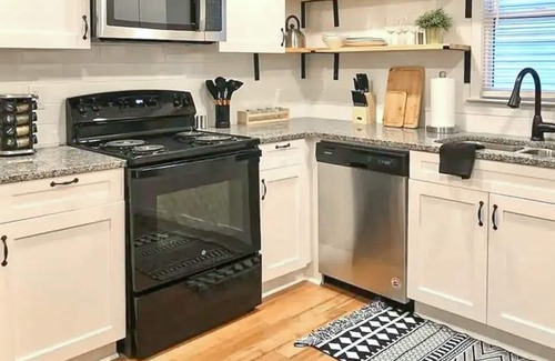 West End Casa | Centrally located West End home with 2 apts, AC, & W/D - dog-friendly