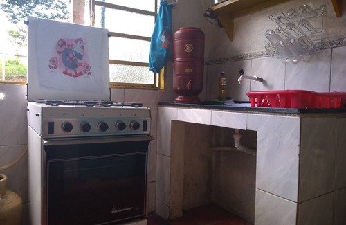Sao Thome das Letras Cabaña | Guinea grass farm with a beautiful chalet