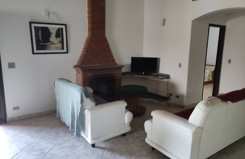 Suzano Casa | Chacara house with fireplace and lake on the property
