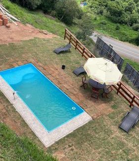 Caldas Hotel | Chacrinha pousada e restaurante Chalé Seriema