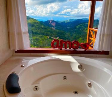 Goncalves Chalet De Esquí | Chalé 2 hidromassagem lareira e cozinha