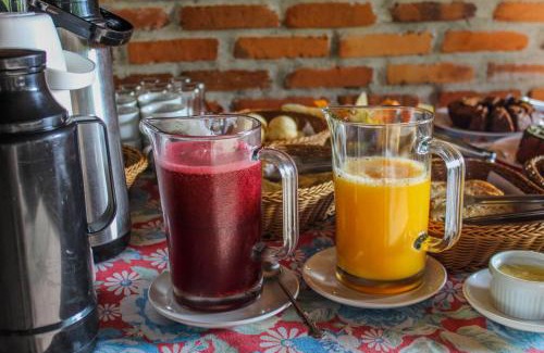 Praia Grande Casa | Chalé Suiço com Hidromassagem e café da Manhã