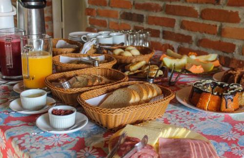 Praia Grande Casa | Chalé Suiço com Hidromassagem e café da Manhã