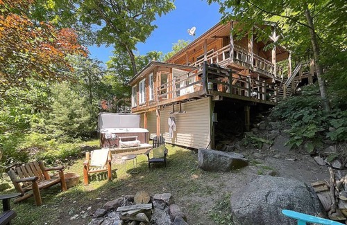 St-Adolphe-d'Howard Chalet De Esquí | Courchevel chalet with lake and year-round spa in the mountains!