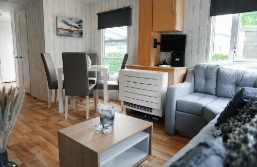 Kortgene Chalet De Esquí | Chalet met overkapping op camping aan het Veerse Meer