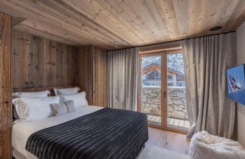 Saint-Marcel Chalet De Esquí | Chalet neuf avec piscine chauffée, espace détente, sauna, bain nordique et salle de cinéma - FR-1-570-57