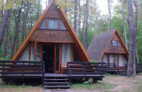 Sierakow Chalet De Esquí | Chalet en un parque de vacaciones en una zona boscosa junto al lago y cerca de una playa.