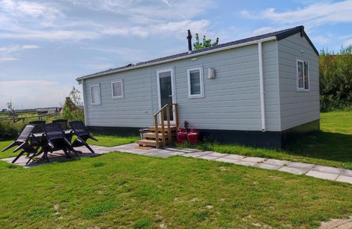 Grijpskerke Chalet De Esquí | Chalet Weizicht op minicamping Hoogelande