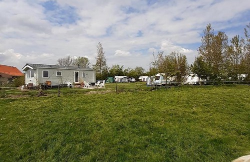 Grijpskerke Chalet De Esquí | Chalet Weizicht op minicamping Hoogelande