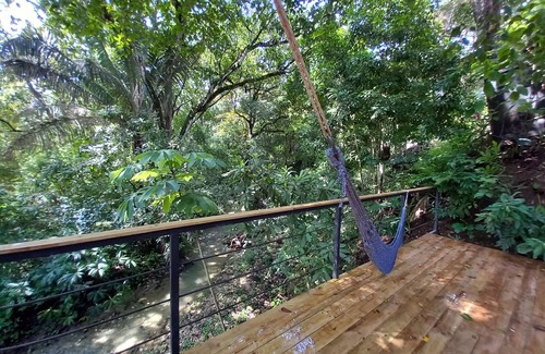 Buenos Aires Chalet De Esquí | Chalet with jungle view deck on a river in lively Santa Teresa's surf town