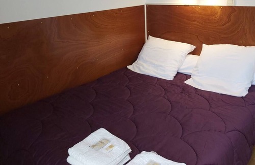 Generac Cama Y Desayuno | Chambre Meublée Avec Kitchenette Dans un Jardin Fleurie à la Campagne