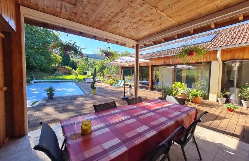Anould Cama Y Desayuno | Chambres de charme avec jacuzzi, hammam et piscine, au cœur de la nature près de Gérardmer - FR-1-589-489