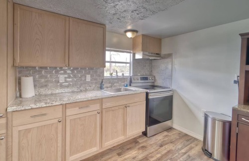 Southside Rural Community Casa | Charming 2-bedroom 2-full bath home with fishing dock, kayaks, WiFi, AC and more