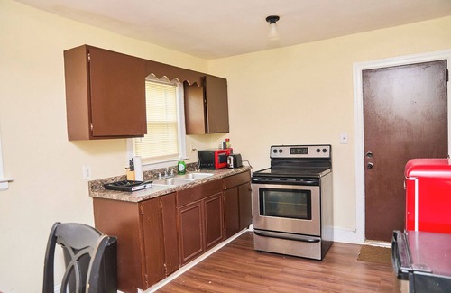 North Charlotte Casa | Charming 2-Bedroom Brick Home with Fireplace in Plaza-Shamrock Neighborhood