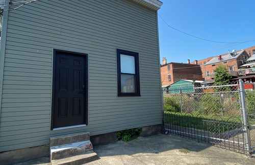 Covington Casa | Charming 2-bedroom house with WiFi, off street parking and side yard.