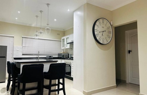 Harare Casa | Charming 2-bedroom house in peaceful Harare with a Pool ,AC, WiFi & fitness room