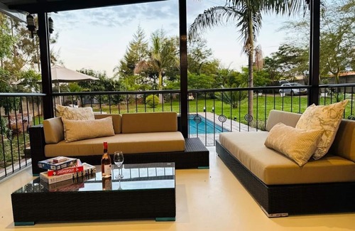Harare Casa | Charming 2-bedroom house in peaceful Harare with a Pool ,AC, WiFi & fitness room