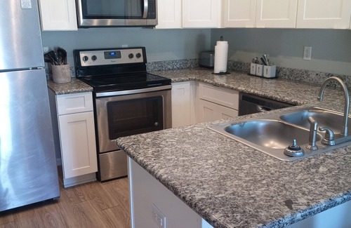 Lake Charles Casa | Charming 2-bedroom townhome with WiFi, AC in tranquil Lake Charles