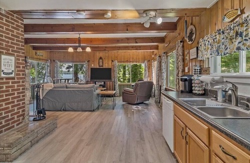 Steele Creek Cabaña | Charming 2BR/1BA Lakefront Cottage w/ Private Beach and Dock