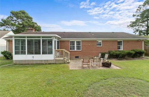 Portsmouth Casa | Charming 3-Bed Brick Home with Sunroom & Fireplace