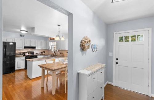 Portsmouth Casa | Charming 3-Bed Brick Home with Sunroom & Fireplace