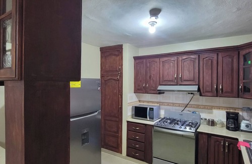 Santo Domingo Este Casa | Charming 4-bedroom house with AC and WiFi in Santo Domingo Este