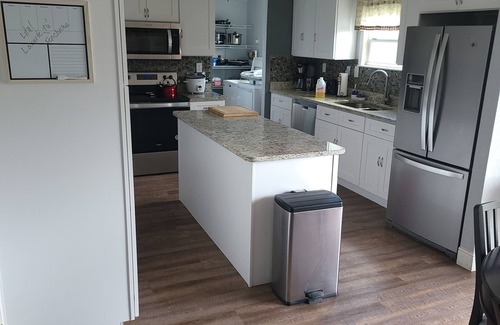 Kissimmee Casa | Charming 4-bedroom house with coffee/tea station WiFi and AC in Kissimmee