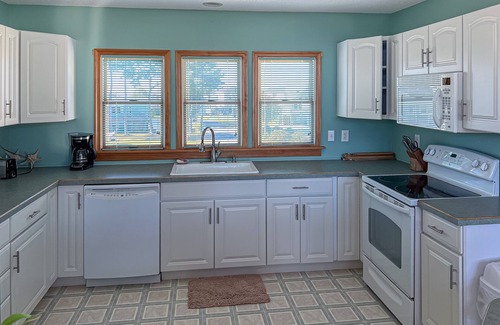 Colington Harbour Casa | Charming 4BR waterfront home with Private Hot Tub
