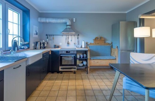 Aventoft Apartamento | Encantadora y acogedora casa de vacaciones con chimenea.