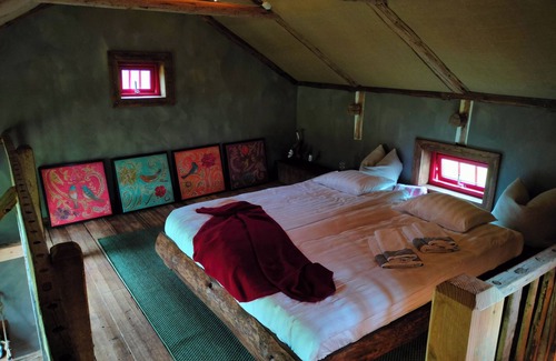 Arjang Cama Y Desayuno | Charming B&B mixed farm with an unique, cozy cottages with a fantastic view.