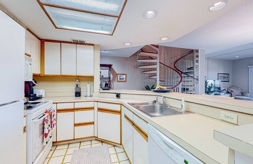 Shelter Cove Villa | Charming bay view villa with pool, washer/dryer, balcony, TV, & full kitchen