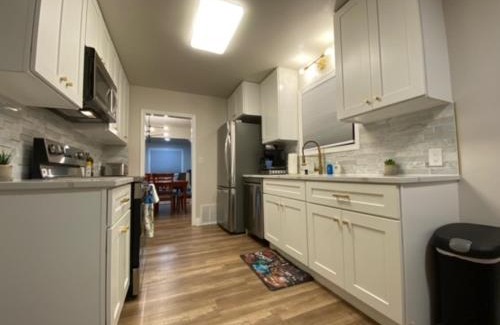 Logan Casa | Charming Brick Home with bonus space & foosball