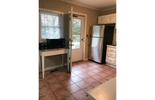 Buford Highway Casa | Charming bungalow in quiet neighborhood inside 285